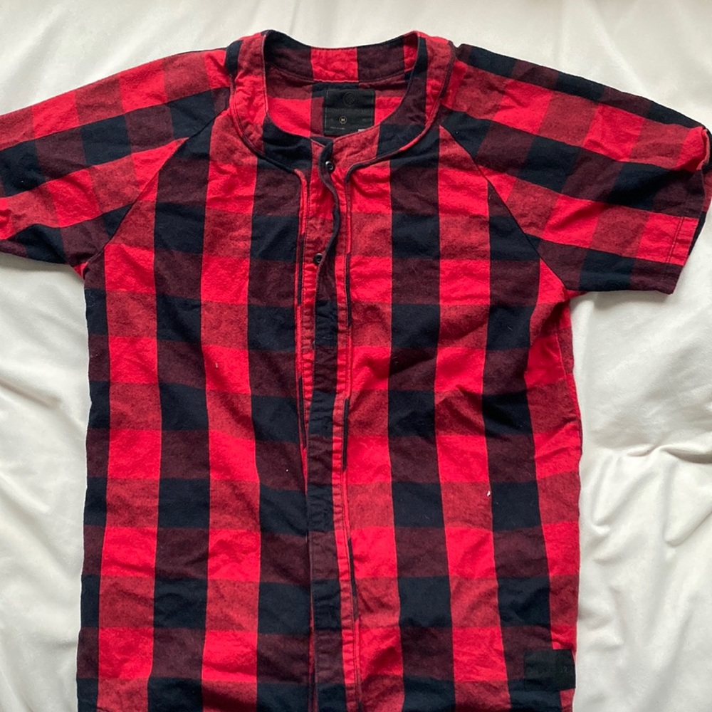 Plaid baseball jersey style tee.